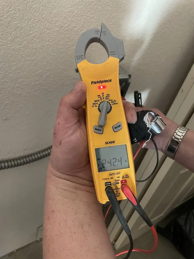 Voltage testing with clamp meter during Circuit Breaker Repair in North Middleton